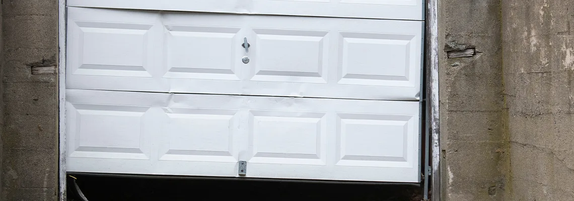 Garage Door Got Hit By A Car Dent Removal in Ottawa, ON