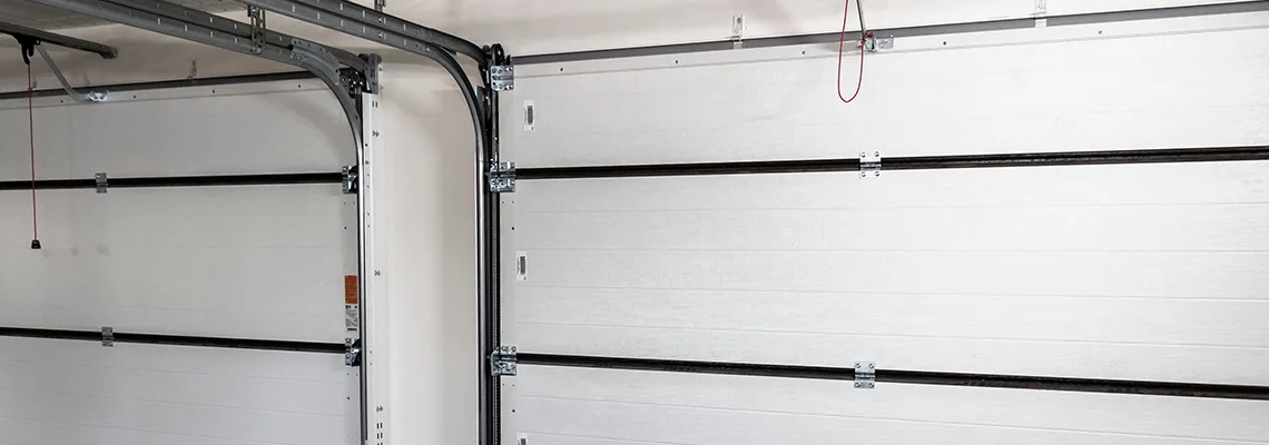 Fix Folding Garage Door Jerking in Ottawa, Ontario