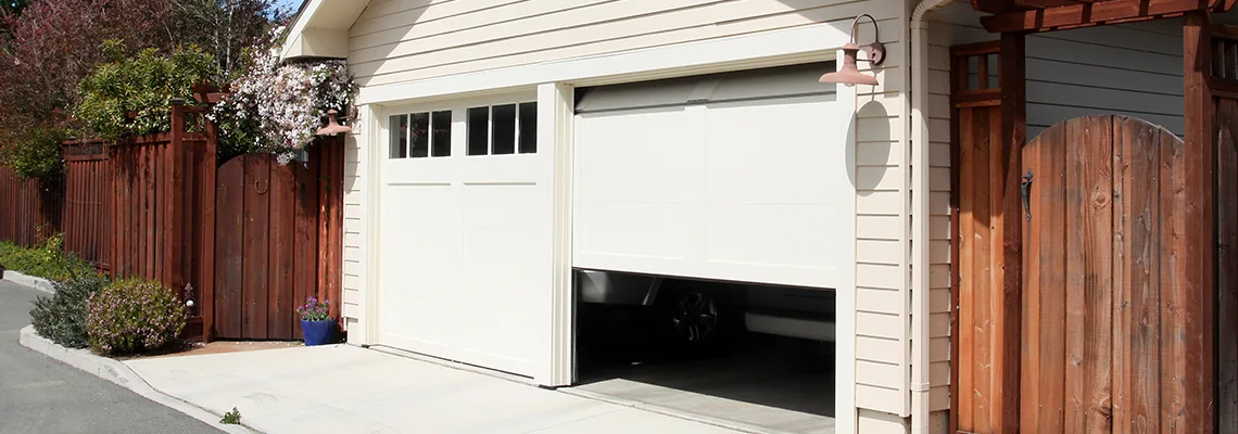 Fix Metal Garage Door Jerking in Ottawa, Ontario